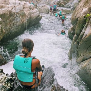 Sliding a waterfall. Fun Things to Do in Puerto Rico